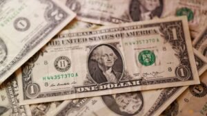 Dollar steady ahead of Fed decision; focus on UK budget