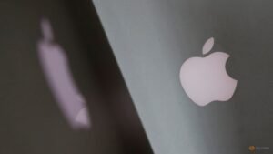 Apple shows pricey touchscreen laptops, a first for the iPhone maker