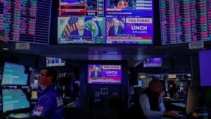 Euro edges up versus dollar after ECB holds rates