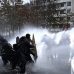 Clashes break out as hundreds of thousands protest in France