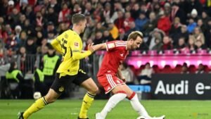 Kane misses penalty, hits post as Dortmund snatch draw