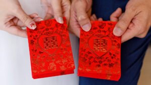 Man charged with stealing red packet box from wedding reception at Raffles Hotel