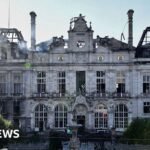 Ruins of city hall a symbol of France divided by protests