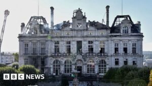 Ruins of city hall a symbol of France divided by protests
