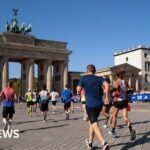 Chinese runner dropped by sponsor after riding bike in marathon