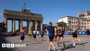 Chinese runner dropped by sponsor after riding bike in marathon