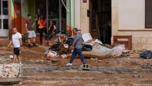 Flooding in southeastern Spain has killed a 102-year-old woman and trapped some 90 people