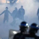 France suspends use of stun grenades against protesters
