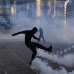 France protests: Clashes reported as 320,000 take to the streets