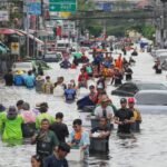 Thailand warns of more rain as flood death toll rises to 31