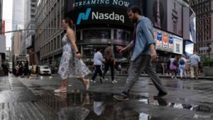 Nasdaq slides to near one-month low as AI rout deepens