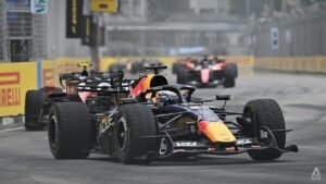 Motor racing-Verstappen wins Singapore sprint after chaotic start in wet conditions