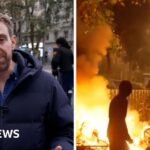 Clean up begins after French riots but police remain