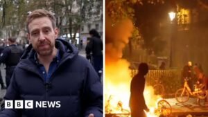 Clean up begins after French riots but police remain