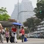 Singaporeans mask up, cut back on outdoor activities as haze level hits season high