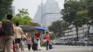 Singaporeans mask up, cut back on outdoor activities as haze level hits season high